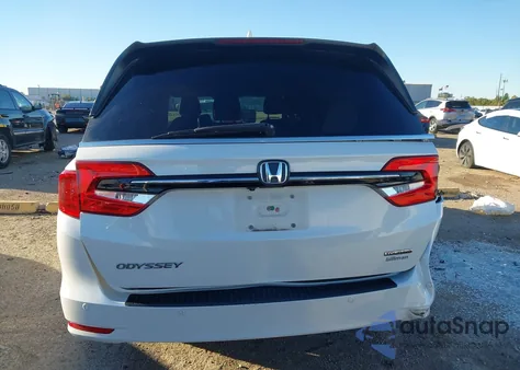 2021 Honda Odyssey Touring from USA, damaged, VIN 5FNRL6H80MB012183